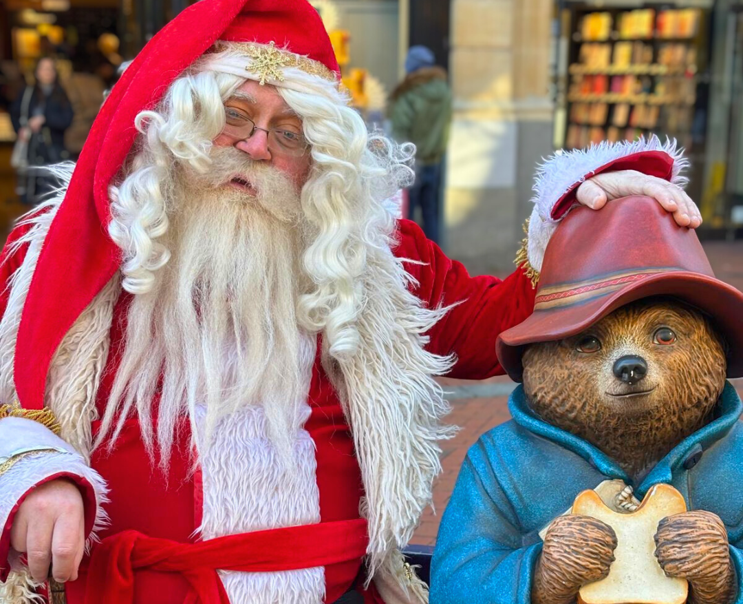 Santa next to Paddington statue